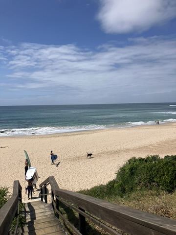 Heading down to Pili Pili Beach with boards for a lesson